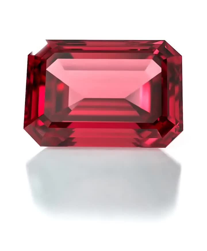 Three-Stone Engagement Ring: gold, ruby, diamonds