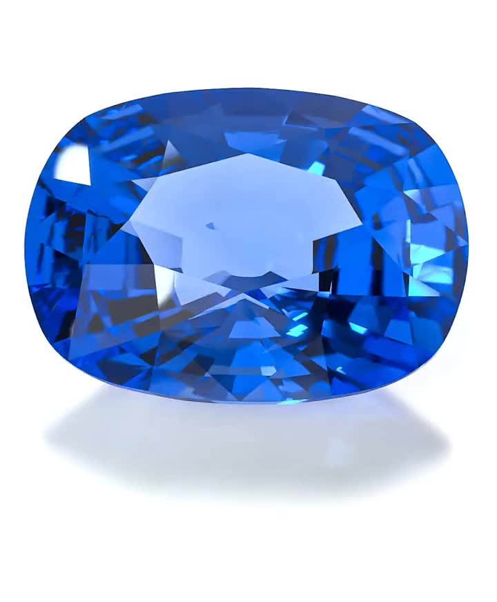 Engagement Ring: white gold, blue sapphire, diamonds